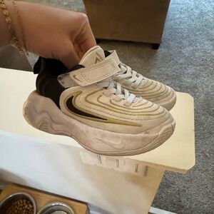 Nike Kids White and Black Sneakers with Gold Accent
